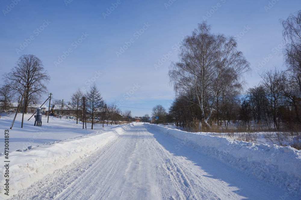 road in winter,cleared road in winter in the village from the snow road in winter,cleared road in winter in the village from the snow