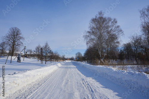 road in winter,cleared road in winter in the village from the snow © retbool