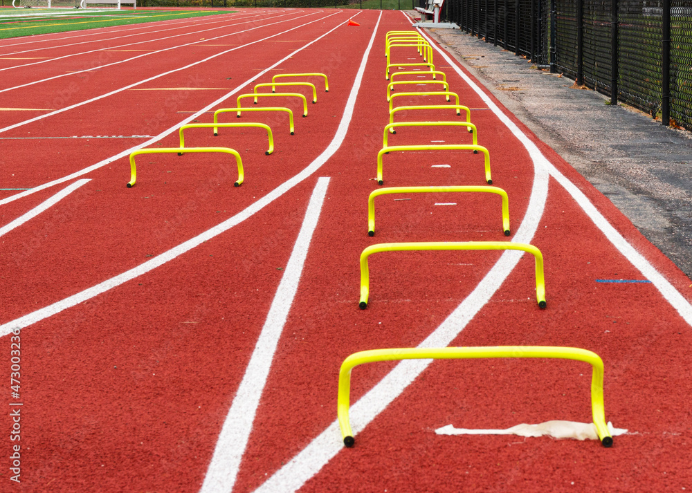 Small hurdles set up on a track for runners to run the wicket drill