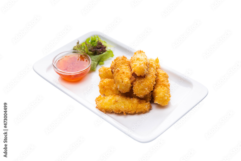 Side view of fried cheese in panko breadcrumbs served with lettuce. sweet and sour sauce in saucepan near dish isolated on white background. Fry cheese finger food
