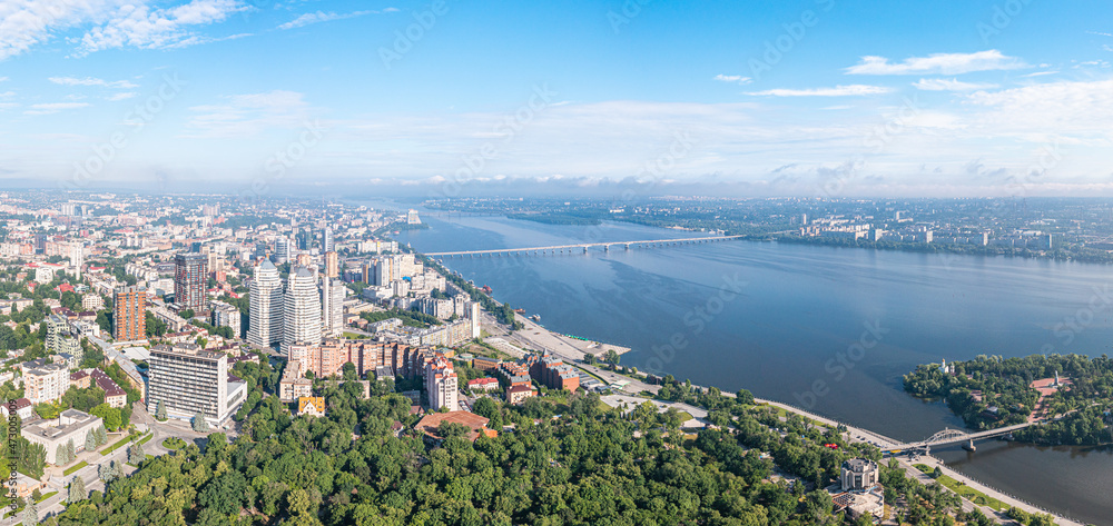 Dnepropetrovsk, Ukraine - Summer 2021: Aerial view of the central area of the city. The coastal part of the city. Dnieper river embankment. View from above. Panorama