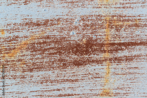 Old surface for background. Paint color - Irish Coffee, Spindle. Rusty spots, stripes.