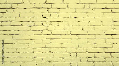 Brick bright yellow wall background or texture.