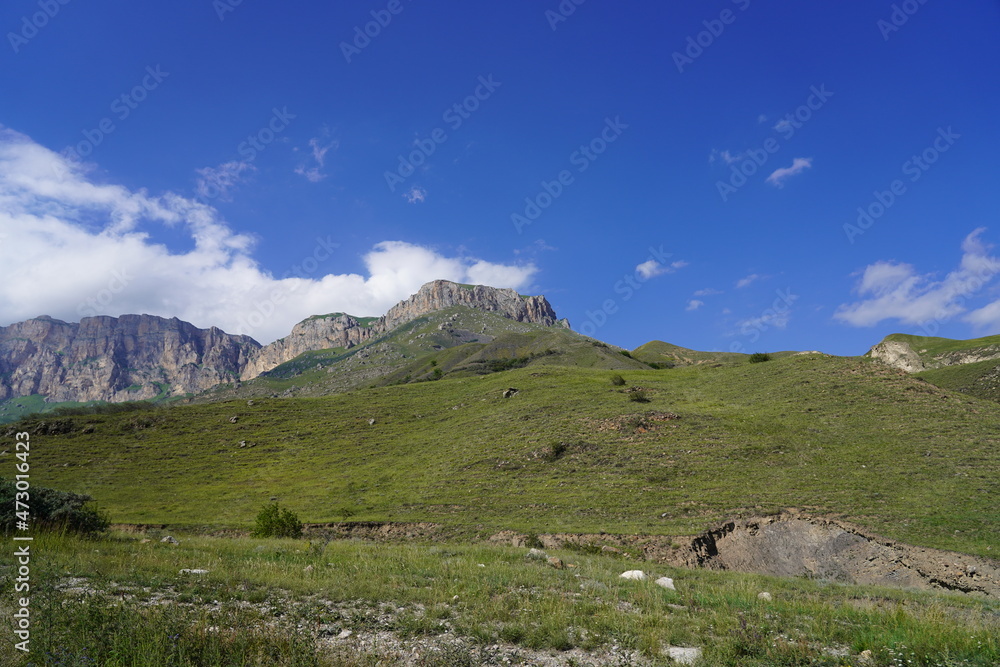Fototapeta premium Landscape with sky and clouds. Rocks and hills