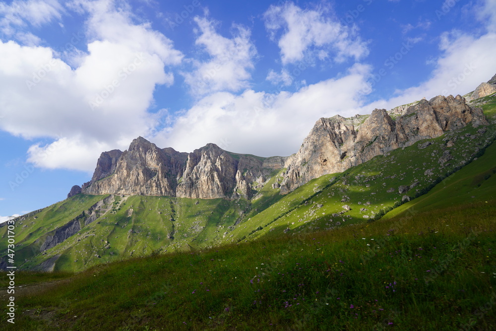 Fototapeta premium Landscape with sky and clouds. Rocks and hills