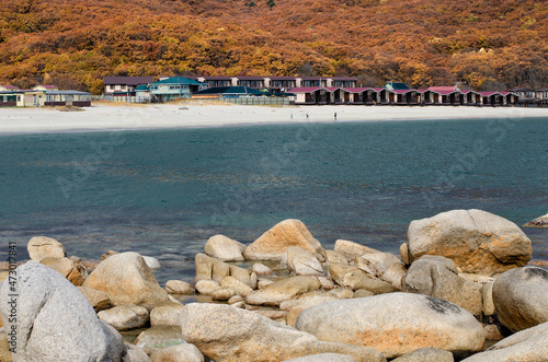 The coast of the sea bay with cottages for tourists.