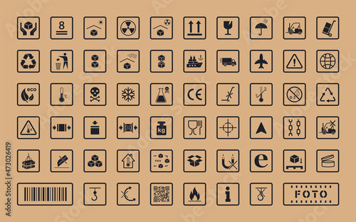 Packaging symbols set on cardboard background. Collection of cargo symbols, packaging icons, packaging signs. Such as: recycle, don't litter, handling with care, flammable and other. Vector