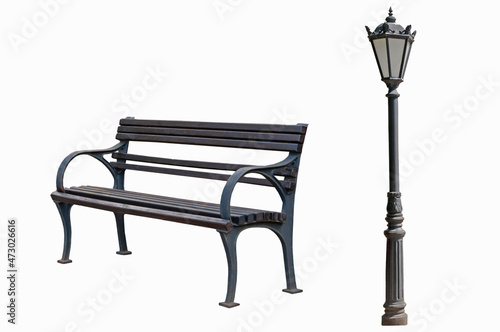 Old wooden street bench in brown tones and vintage street lamp on white isolated background