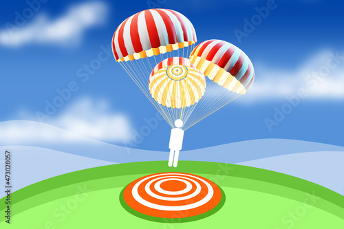 Businessman on parachute la...