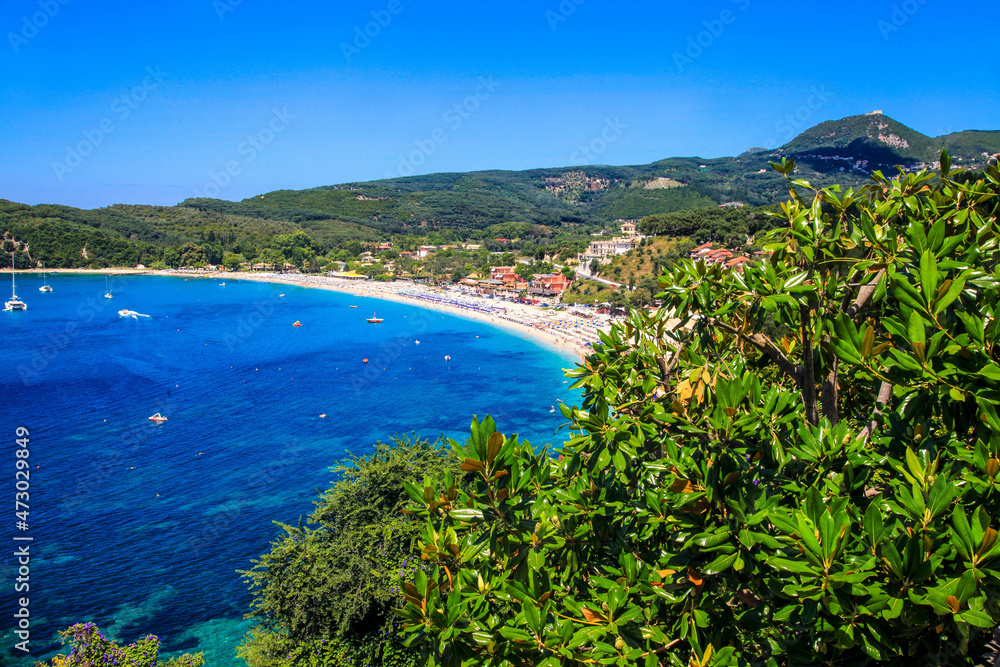The view from lemon tree on Valtos beach and blue sea in Parga, Greece