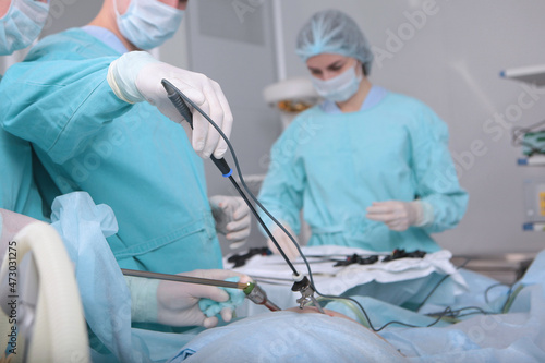Laparoscopic surgery. A real operation. Hernia removal. Modern surgery. Life saving. Surgeons perform laparoscopic surgery.