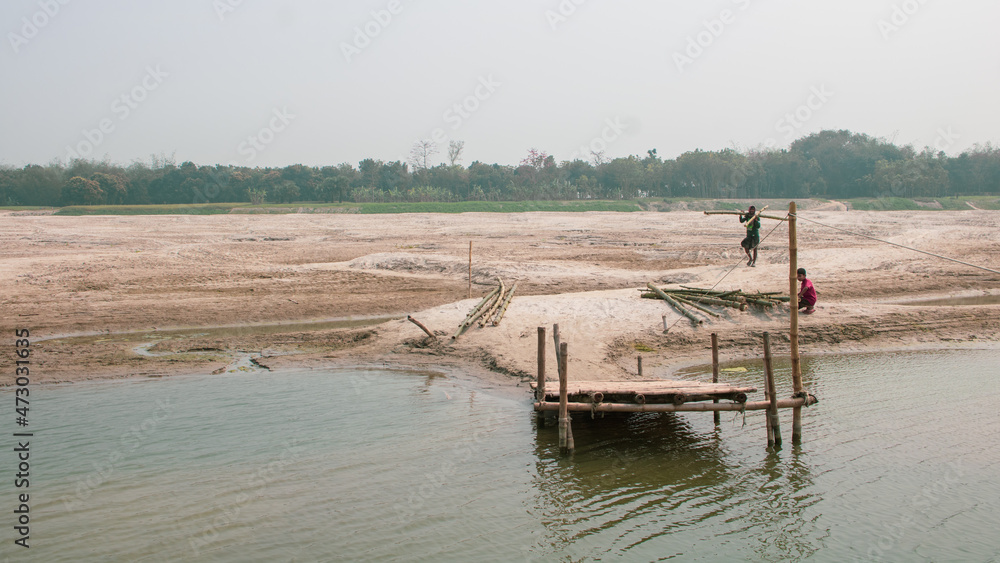 The Gorai-Madhumati River is one of the longest rivers in Bangladesh and a tributary of the Ganges. This river of Bangladesh is full of amazing beauty. People cross by boat.