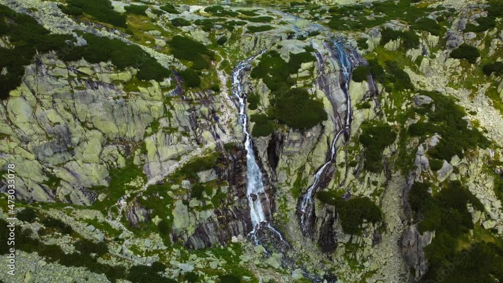 Skok waterfall and the lake in the western part of High Tatras, Slovakia Skok waterfall and the lake in the western part of High Tatras, Slovakia