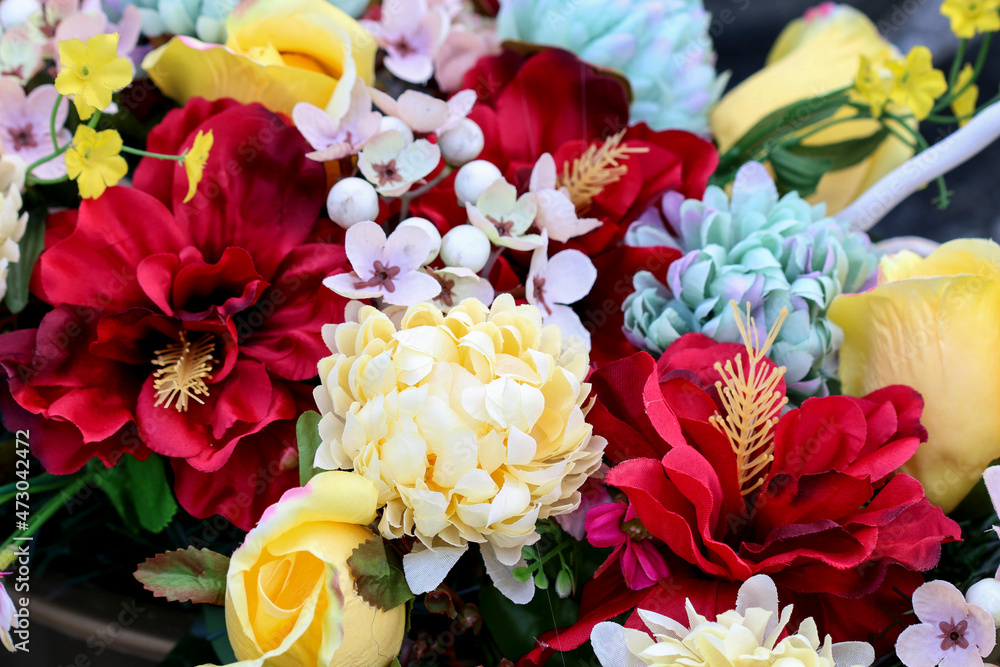 A beautiful floral arrangement with artificial flowers A beautiful floral arrangement with artificial flowers