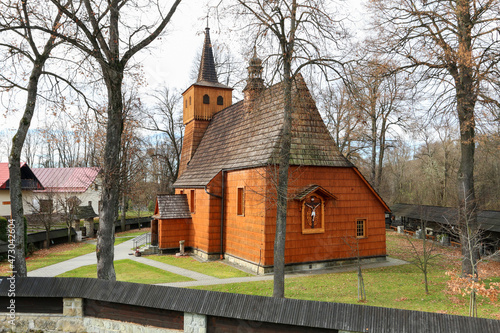 LOPUSZNA, POLAND - NOVEMBER 14, 2021: Old wooden church in Lopuszna, Poland.