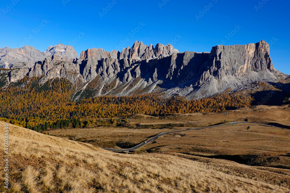 Scenic landscape of Giau Pass or Passo di Giau - 2236m. Mountain pass in the province of Belluno in Italy, Europe. Italian alpine landscape. Travel icon of the Dolomites
