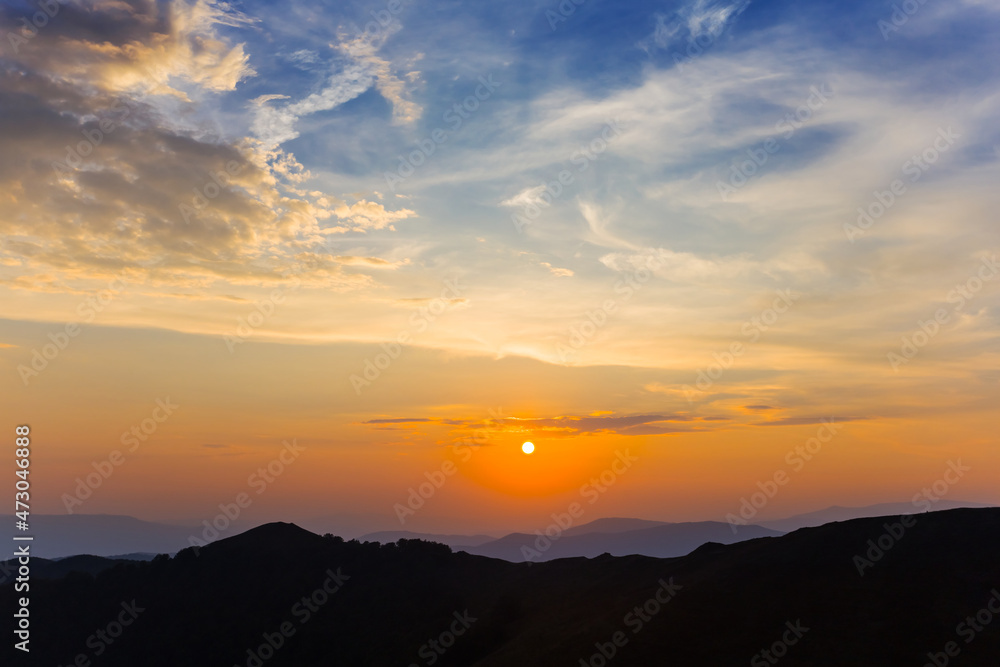 mountain chain silhouette at the early morning, natural travel background