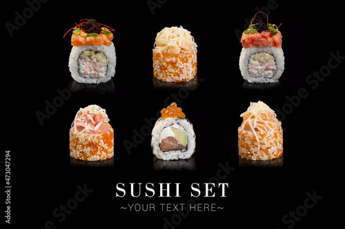 Large Set of salmon Japanese sushi roll different pieces isolated on black background. Advertising menu banner with text space. Seafood variety with crab, tuna, avocado and cucumber 