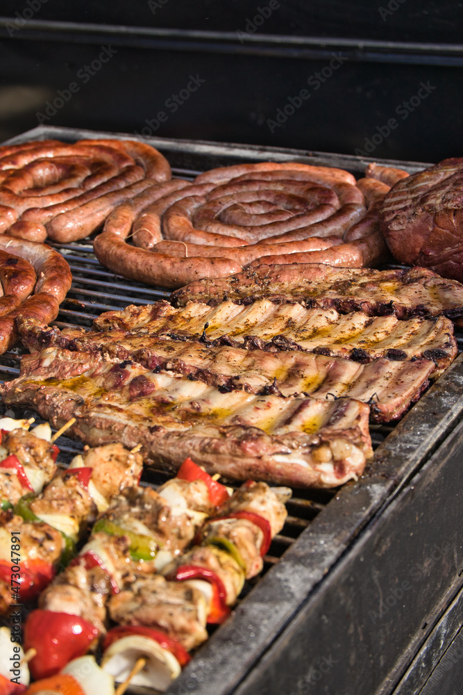 Argentine barbecue in a sunny day. Festivity, celebration, banquet.