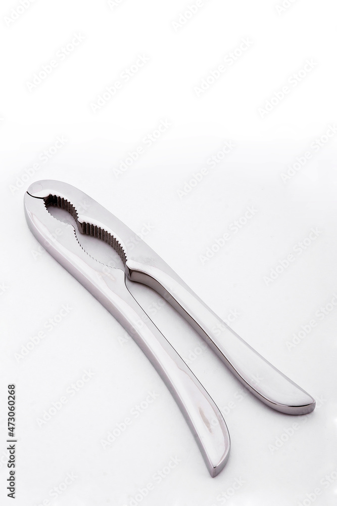 Nut tongs isolated on white background with space for text Nut tongs isolated on white background with space for text