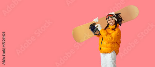 Female snowboarder on color background with space for text