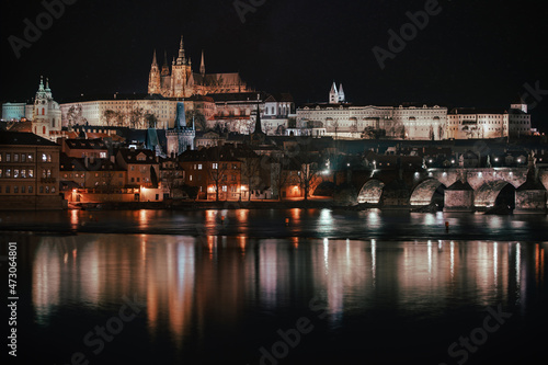  prague castle and st. vitus and cathedral bridge on ece vltava at night in the center of prague © svetjekolem