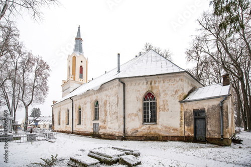 Old historical lutheran church in winter day, Barbele, Latvia