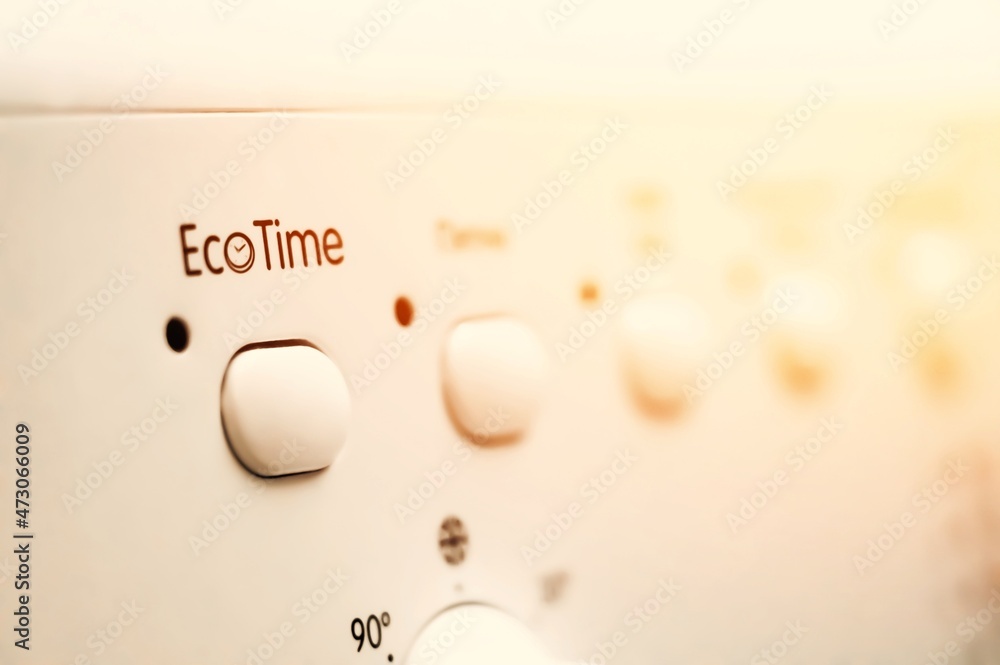 Washing machine control panel. Regime EcoTime. Buttons for switching modes of operation. Selective focus Washing machine control panel. Regime EcoTime. Buttons for switching modes of operation. Selective focus