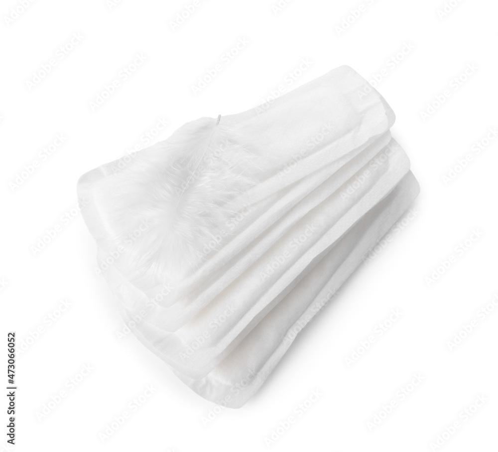 Menstrual pads and feather on white background Menstrual pads and feather on white background