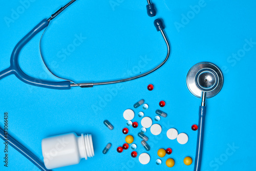 pain reliever Pharmaceuticals medicines syringe blue background