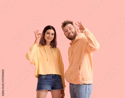 Cool young couple in hoodie...