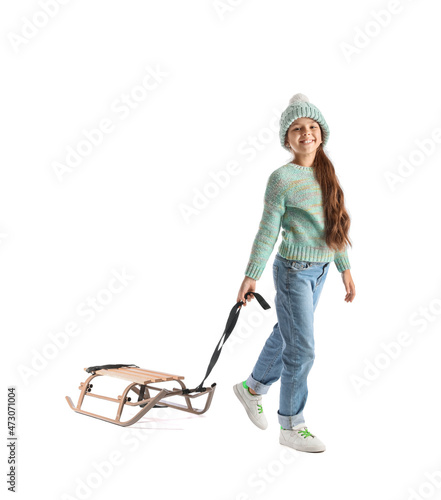Little girl with sled on wh...