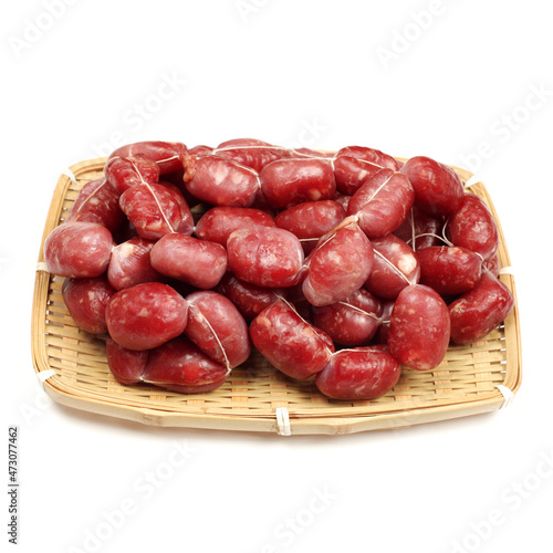 Mini sausages isolated on white background