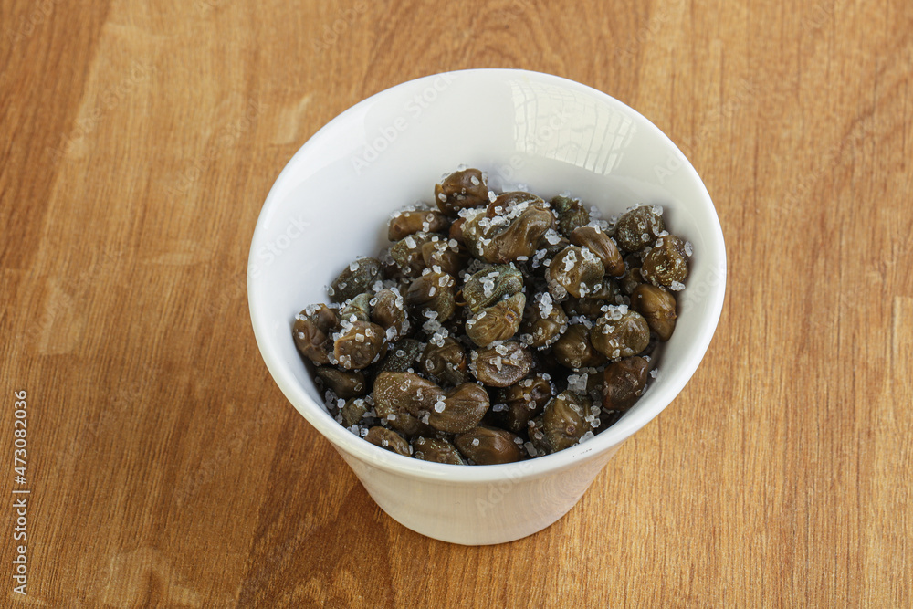 Salted marinated capers snack appetiser Salted marinated capers snack appetiser