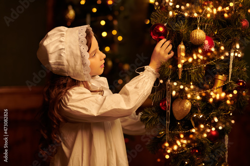 kid admiring xmas toys