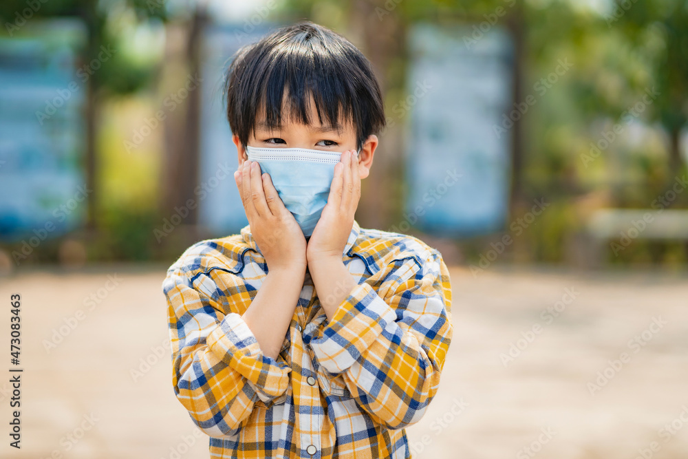 children boy wearing a mask to prevent dust and viruses children boy wearing a mask to prevent dust and viruses