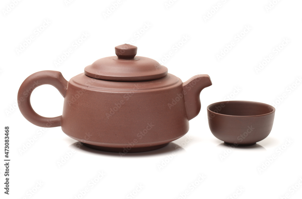 Ceramic teapot for brewing tea on white background Ceramic teapot for brewing tea on white background