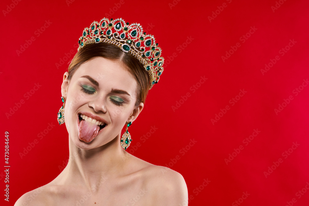 beautiful woman with a crown on her head makeup decoration isolated background beautiful woman with a crown on her head makeup decoration isolated background