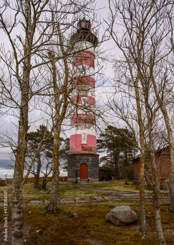 Shepelevsky Lighthouse, Leningrad Oblast. White-red lighthouse. lighthouse on the shores of the Gulf of Finland. photo