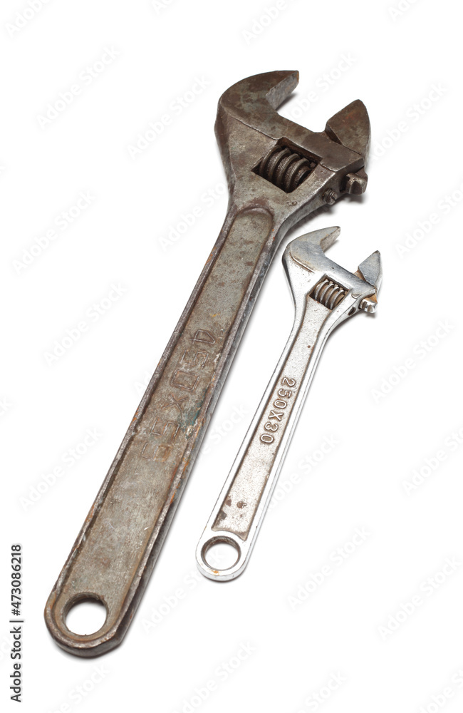 Old adjustable wrench isolated on white background Old adjustable wrench isolated on white background