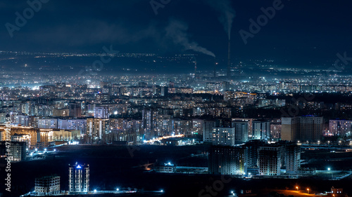View on Bishkek city from mountains photo