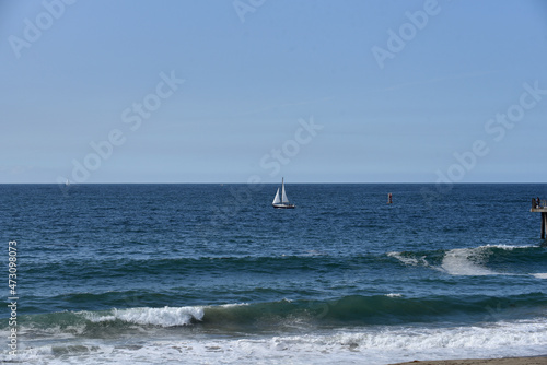 Sailboat in the Pacific Ocean on a summer day