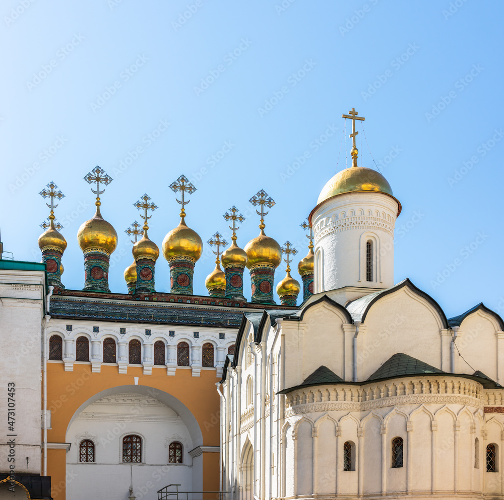 Golden domes of Upper Saviour Cathedral and Terem Churches at the Grand Kremlin Palace in Moscow.
