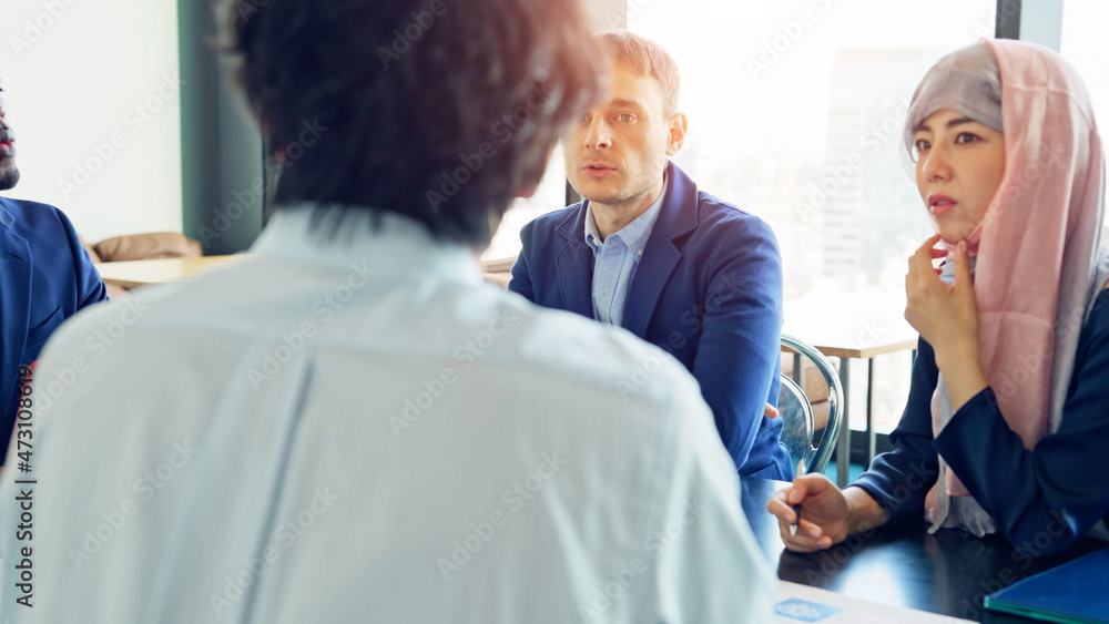 Group of multi racial people meeting in the office. Global business. Teamwork of business. Diversity. Group of multi racial people meeting in the office. Global business. Teamwork of business. Diversity.