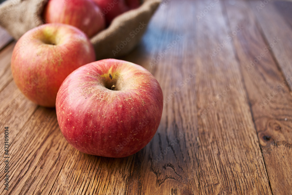 apples on a wooden table vitamins fresh fruits organic apples on a wooden table vitamins fresh fruits organic