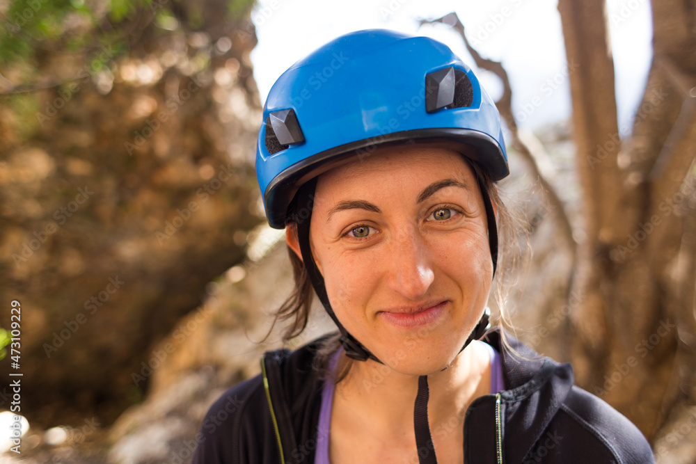 Portrait of smiling woman in safety helmet
