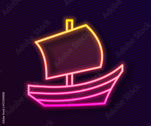 Glowing neon line Egyptian ship icon isolated on black background. Egyptian papyrus boat. Vector