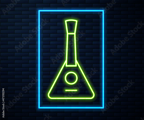 Glowing neon line Musical instrument balalaika icon isolated on brick wall background. Vector