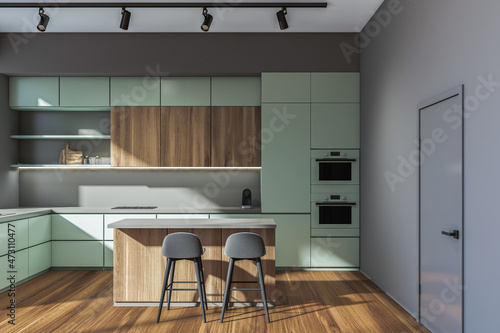 Grey kitchen set interior with dining table and two chairs, shelf with door © ImageFlow
