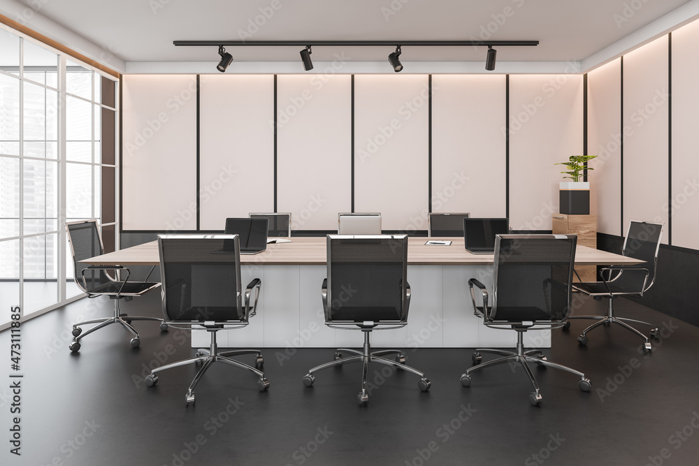 Dark conference room interior with furniture and windows Dark conference room interior with furniture and windows